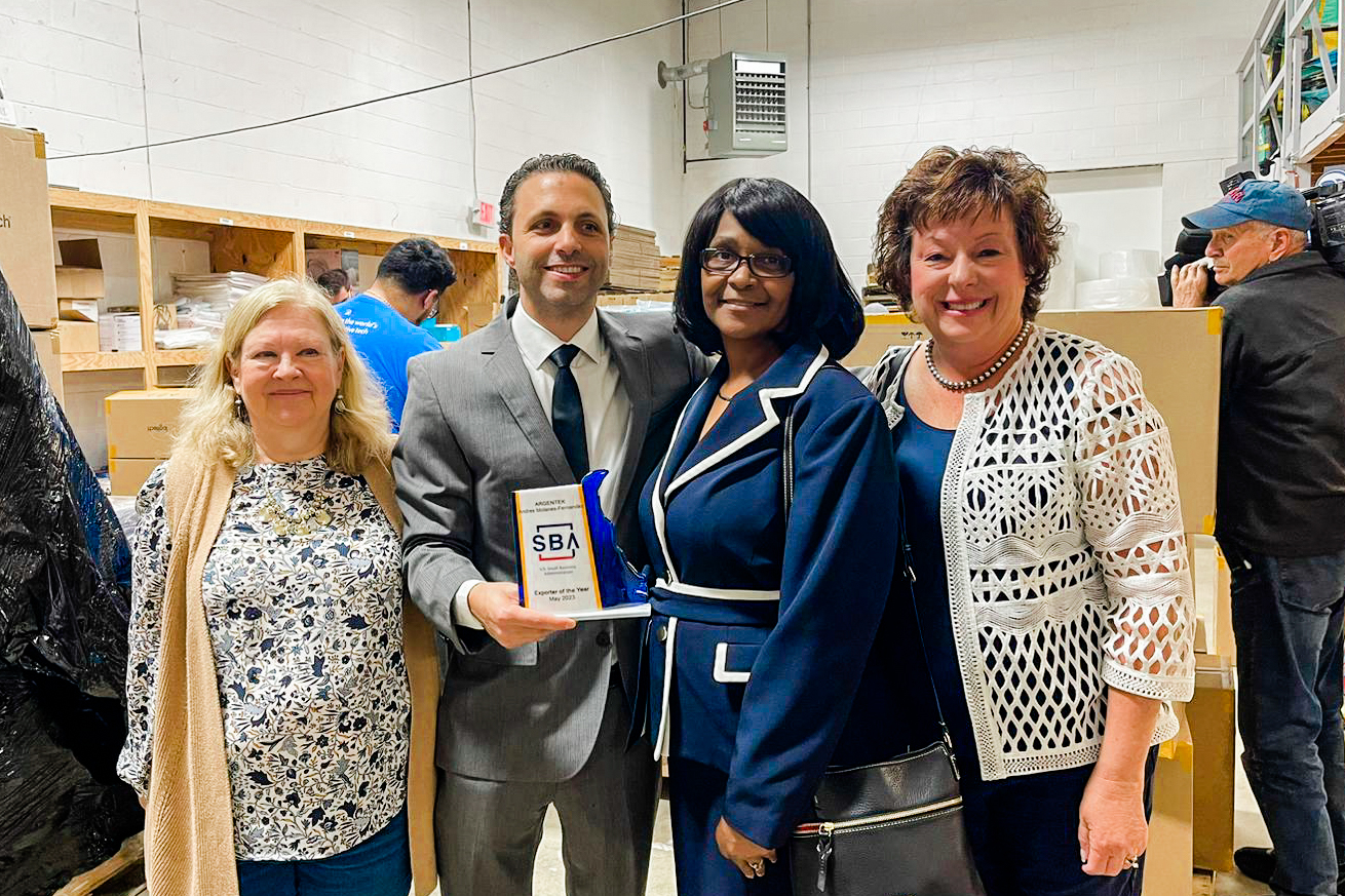CEO Andres Molanes with Michelle Harris from the SBA and Margo Reign from the SBDC